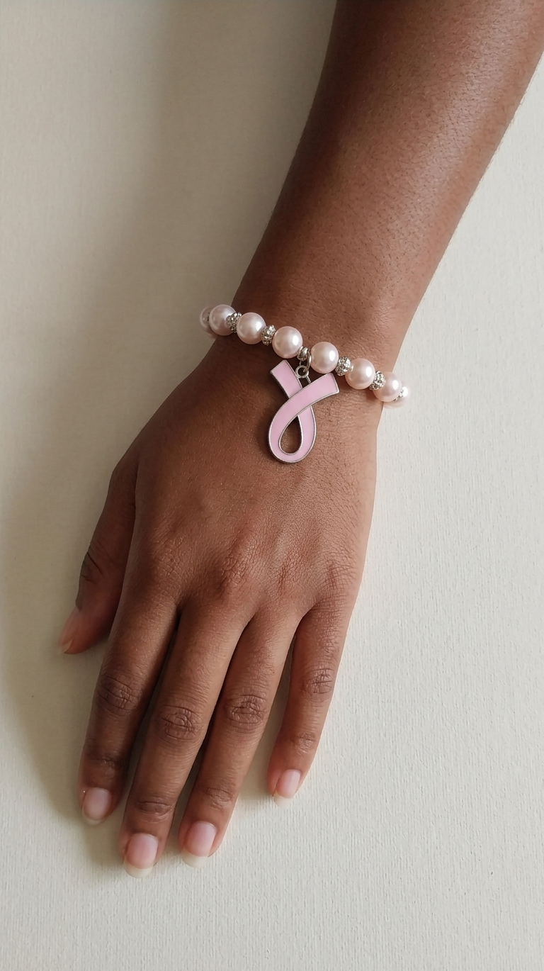 Breast Cancer lighter pink beaded bracelet w/ the Breast Cancer Awareness Ribbon