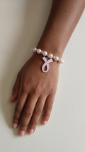 Breast Cancer lighter pink beaded bracelet w/ the Breast Cancer Awareness Ribbon